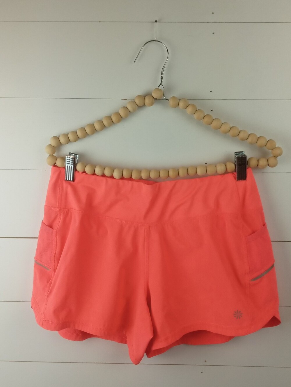 Athleta Women's size S bright orange elastic waist flowy athletic shorts